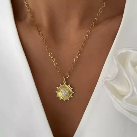 An image of a product called qaşlı ürək detallı boyunbağı