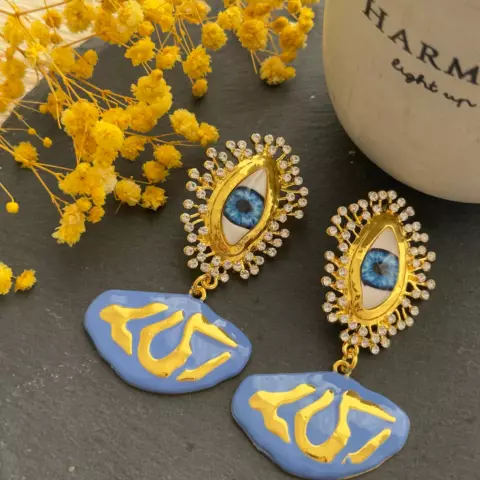 An image of a product called "evil blue eyes" sırğa
