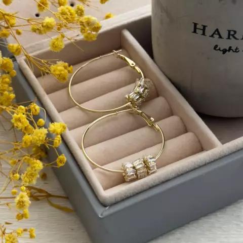 An image of a product called charmlı halqa sırğa