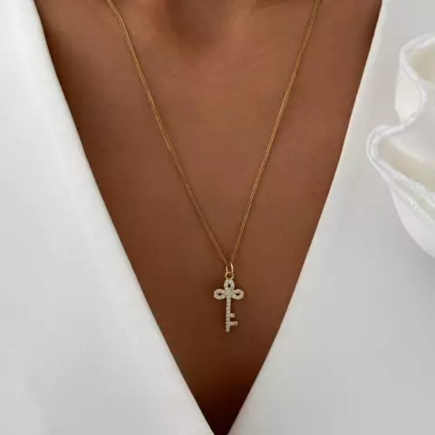 An image of a product called qaşlı mini açar boyunbağı
